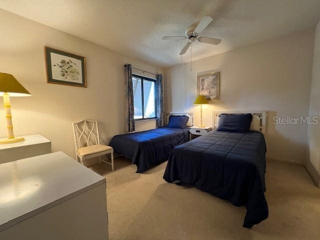 5171 Willow Links Unit 23, Sarasota, FL 34235 - bedroom featuring carpet floors and ceiling fan