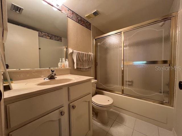 5171 Willow Links Unit 23, Sarasota, FL 34235 - full bath with tile patterned flooring, vanity, and enclosed tub / shower combo