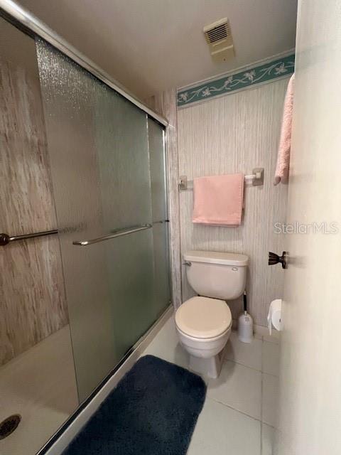 5171 Willow Links Unit 23, Sarasota, FL 34235 - full bath with tile patterned floors and a stall shower