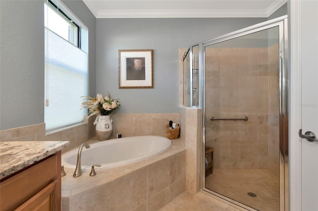 bathroom featuring crown molding, vanity, and independent shower and bath