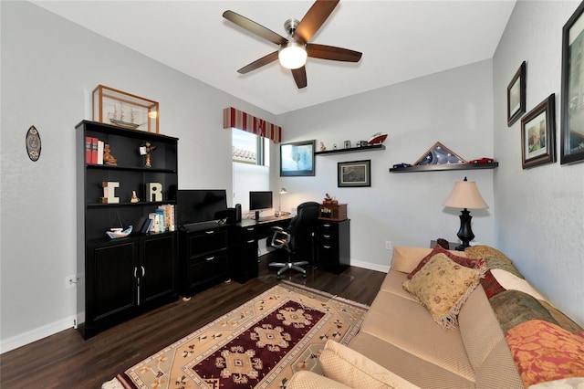 office space featuring ceiling fan and dark hardwood / wood-style flooring