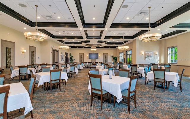 dining room featuring crown molding, dark carpet, a high ceiling, and a notable chandelier