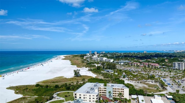 aerial view with a view of the beach and a water view