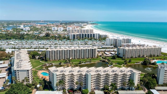 aerial view featuring a view of the beach and a water view