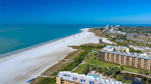 bird's eye view with a view of the beach and a water view