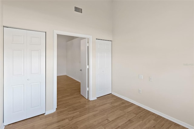 unfurnished bedroom with light hardwood / wood-style flooring