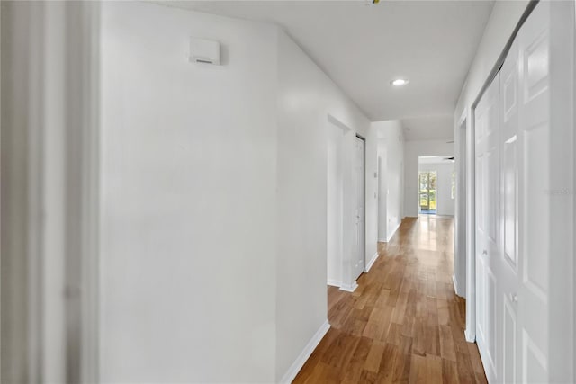 hallway featuring light wood-type flooring