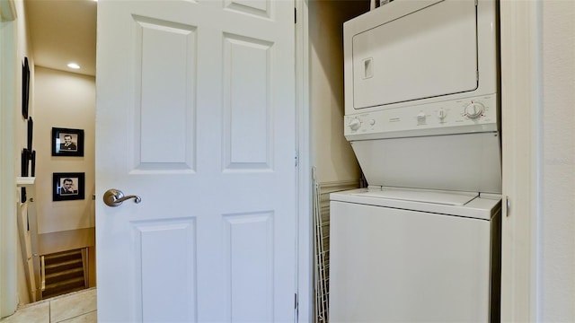 4046 Overture Cir Unit 4046, Bradenton, FL 34209 - laundry room featuring stacked washer / dryer, light tile patterned floors, and recessed lighting