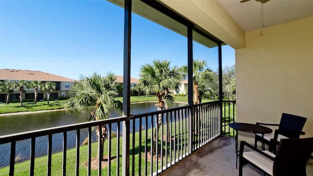 balcony featuring a water view