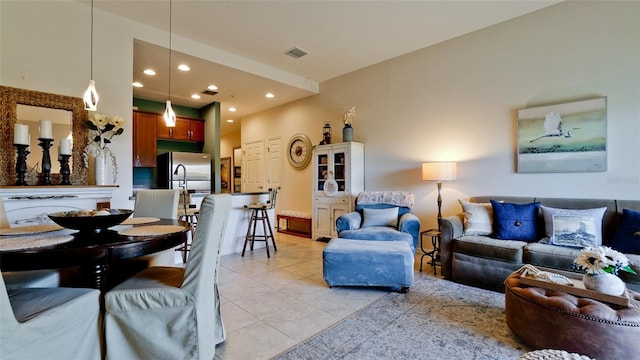 4046 Overture Cir Unit 4046, Bradenton, FL 34209 - living area featuring light tile patterned floors and recessed lighting