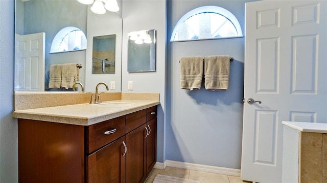 4046 Overture Cir Unit 4046, Bradenton, FL 34209 - full bathroom with vanity, a tile shower, and tile patterned flooring