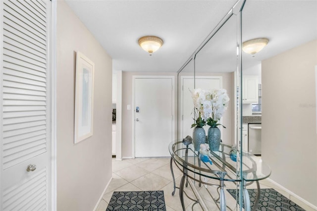 interior space featuring light tile patterned flooring