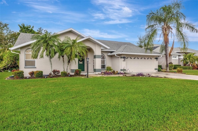 ranch-style home with a garage and a front yard