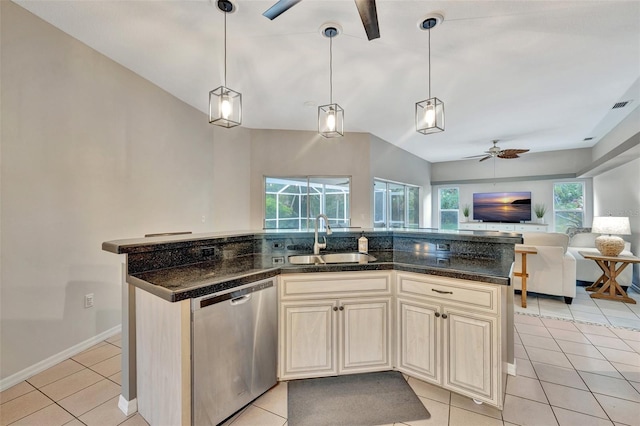 kitchen featuring stainless steel dishwasher, ceiling fan, sink, light tile patterned floors, and decorative light fixtures