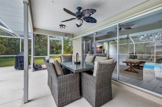 sunroom / solarium with ceiling fan