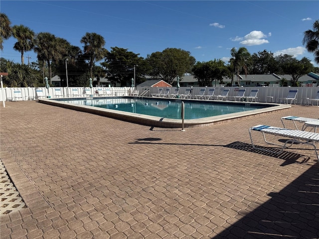 view of pool featuring a patio area