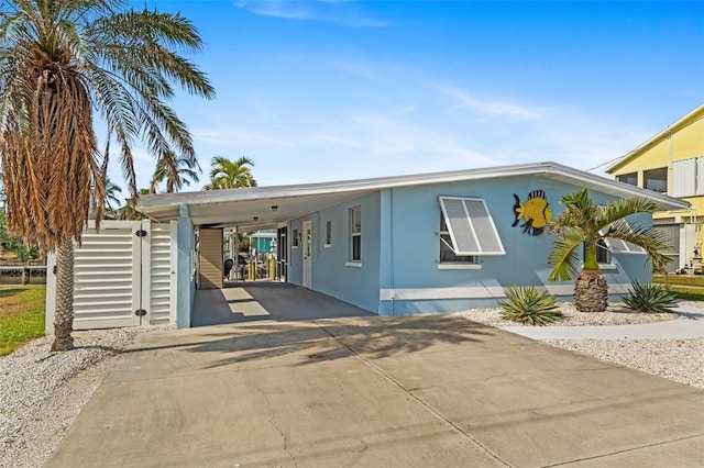 view of front facade featuring a carport