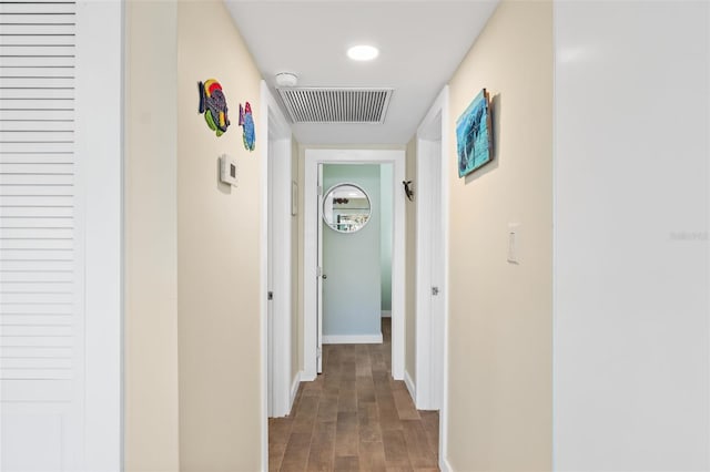 hallway featuring dark hardwood / wood-style floors