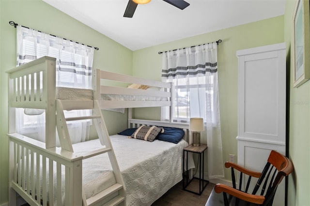 bedroom with multiple windows and ceiling fan