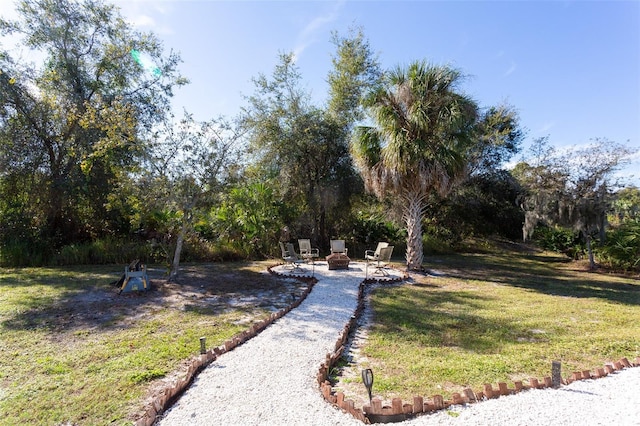 view of yard featuring a fire pit