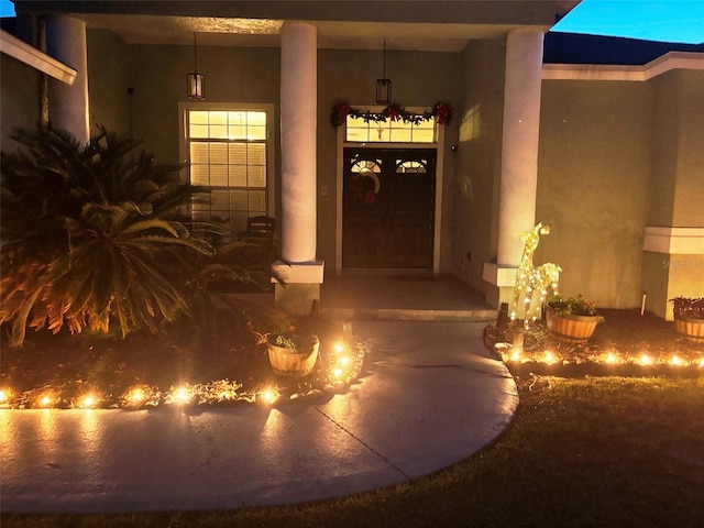 doorway to property featuring a porch