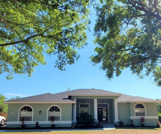 ranch-style house with a front yard