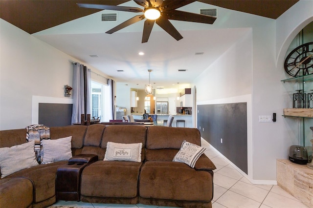 living room with light tile patterned floors and ceiling fan