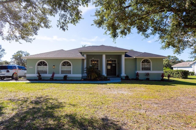 view of front of home featuring a front yard