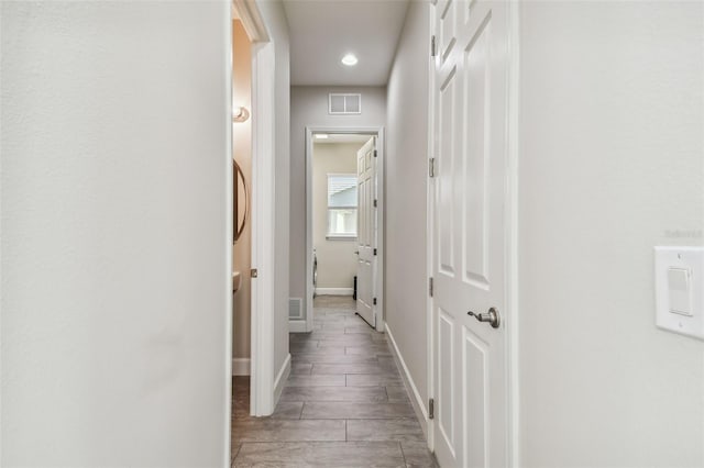 hallway featuring light wood-type flooring