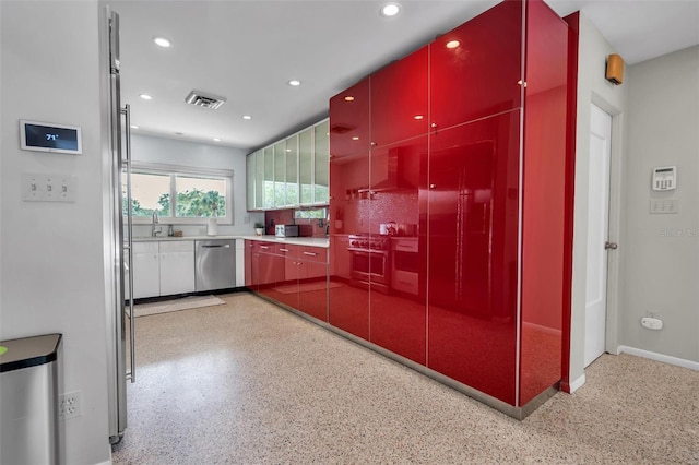 kitchen with dishwasher and sink