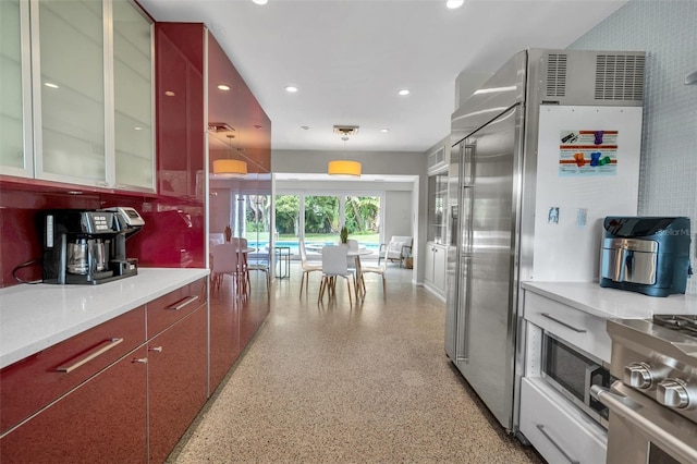 kitchen featuring stainless steel built in refrigerator