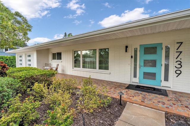 property entrance with a porch