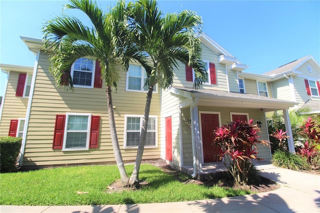 view of front of home with a front lawn