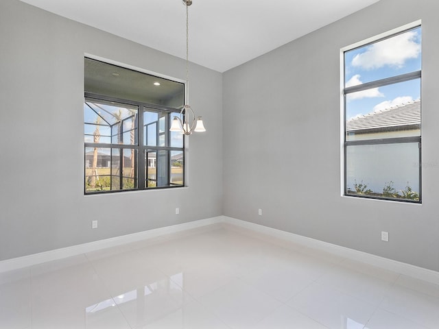 view of tiled spare room