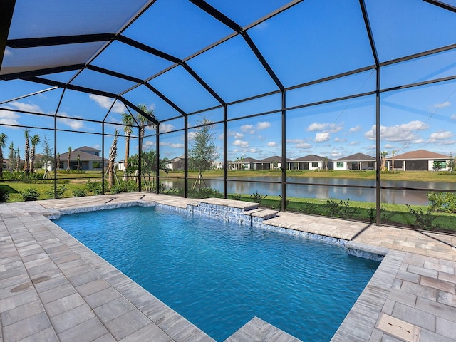 view of swimming pool featuring a lanai, a patio area, and a water view