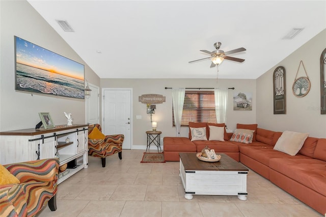 living room featuring light tile patterned floors, ceiling fan, and lofted ceiling