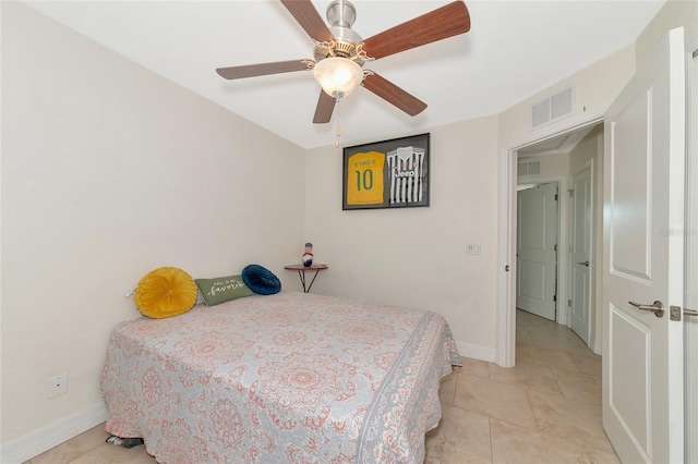 bedroom featuring ceiling fan and light tile patterned flooring