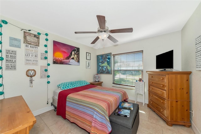 bedroom featuring ceiling fan and light tile patterned floors