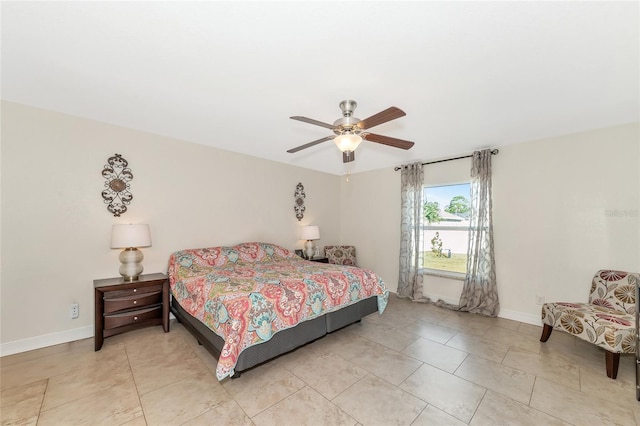 bedroom with light tile patterned floors and ceiling fan