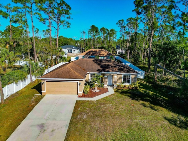 single story home with a front yard and a garage