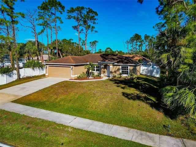 ranch-style home featuring a garage and a front yard