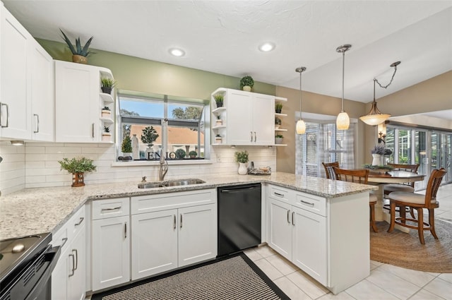 kitchen featuring dishwasher, plenty of natural light, white cabinetry, and range with electric cooktop