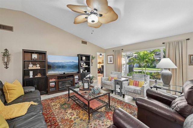 living room with ceiling fan and vaulted ceiling