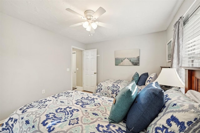 bedroom featuring ceiling fan