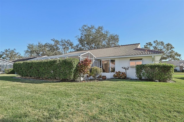 exterior space with a lawn