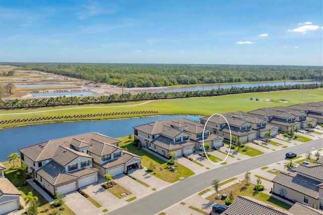 drone / aerial view with a water view