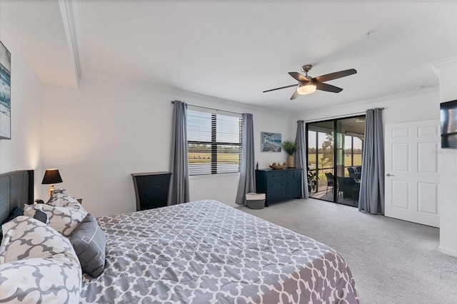 bedroom with light carpet, access to outside, multiple windows, and ceiling fan