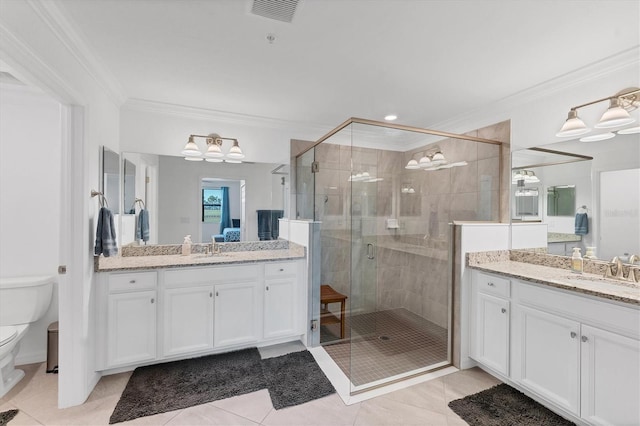 bathroom with tile patterned flooring, crown molding, an enclosed shower, toilet, and vanity