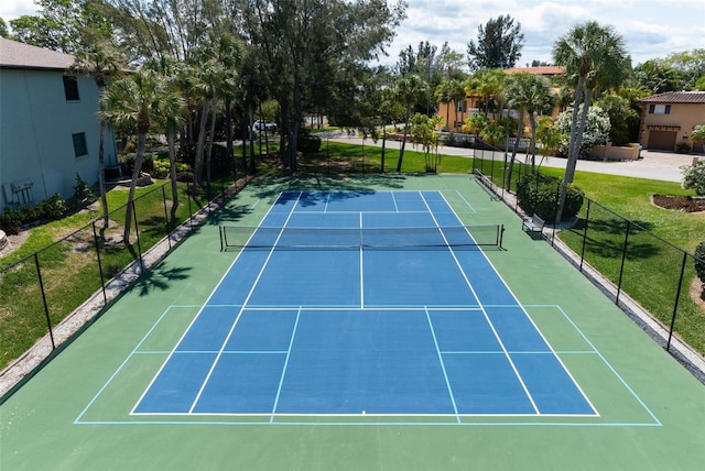 view of sport court with basketball hoop