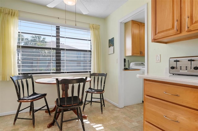 dining space featuring ceiling fan